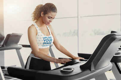 Sports Bra Mockup of a Woman About to Start Running on a Treadmill 38369-r-el2