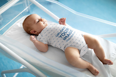 Onesie Mockup of a Happy Baby in a Portable Crib 45749-r-el2