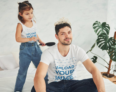 T-Shirt and Tank Top Mockup Featuring a Man Playing with his Daughter