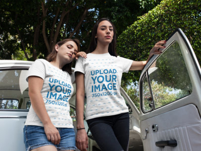 Women Wearing Tshirts Mockup While Standing Near a Vintage Car with Open Door