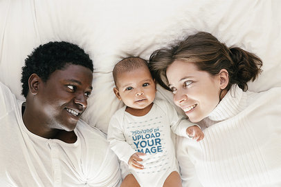 Round-Neck Onesie Mockup Featuring a Baby Boy with His Parents