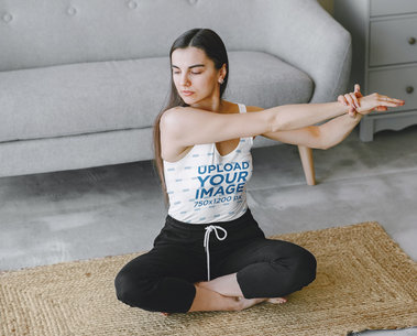 Sublimated Tank Top Mockup of a Woman Stretching in Her Living Room