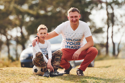 T-Shirt Mockup Featuring a Father and His Son at a Soccer Field
