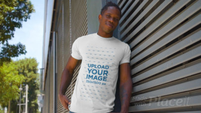 Round-Neck T-Shirt Video of a Smiling Man Posing on the Street