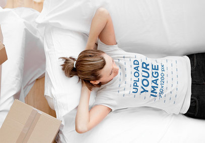 T-Shirt Mockup Featuring a Woman Relaxing