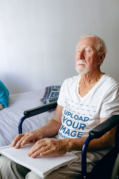 V-Neck Tee Mockup Featuring a Senior Man Reading Braille