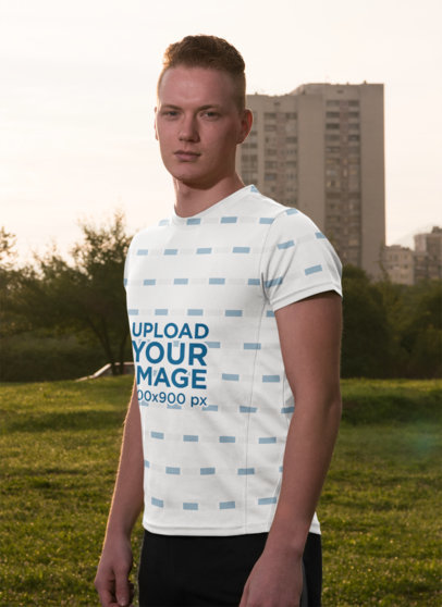 Sublimated T-Shirt Mockup of a Serious Man Posing on a Field m5307 r-el2