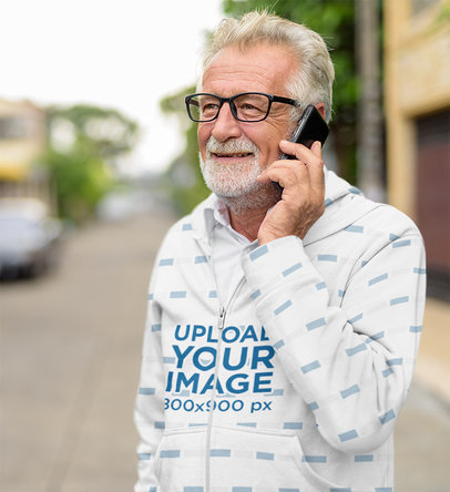 Full-Zip Hoodie Mockup of an Elderly Man Talking on the Phone