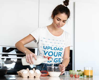 T-Shirt Mockup of a Happy Woman Preparing a Dish m6807 r-el2
