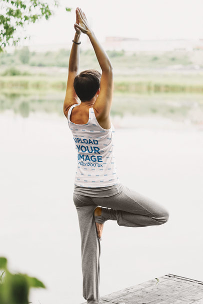 Sublimated Tank Top Mockup of a Woman Doing Yoga by a Lake