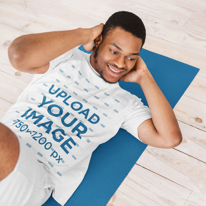 T-Shirt Mockup Featuring a Happy Man Doing Sit-Ups