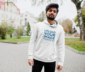 Pullover Hoodie Mockup Featuring a Bearded Man Looking at the Camera