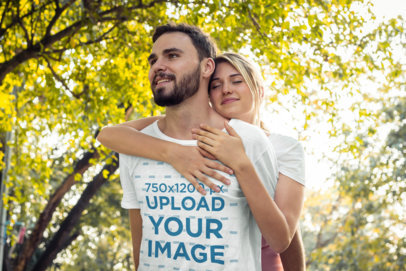 Heathered Tee Mockup of a Bearded Man Being Hugged by His Girlfriend