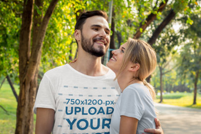 Heather T-Shirt Mockup Featuring a Happy Bearded Man and His Girlfriend at a Park 