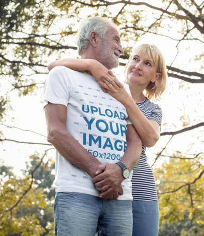 T-Shirt Mockup Featuring a Senior Bearded Man and His Wife at a Park m9887-r-el2