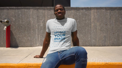 T-Shirt Video of a Man with Locs in an Urban Scenario