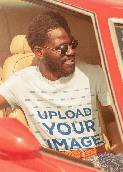 T-Shirt Mockup Featuring a Bearded Man With Sunglasses in a Vintage Car 