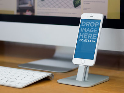 Mockup of a White iPhone 6  on a Standing At The Office