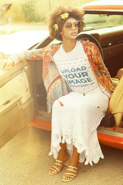 Retro-Themed T-Shirt Mockup Featuring a Woman with Flowers in Her Hair