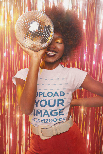 T-Shirt Mockup Featuring a Happy Curly-Haired Woman Holding a Disco Ball m10139