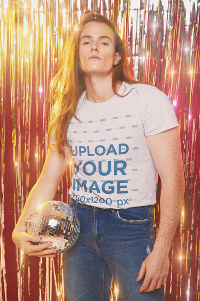 T-Shirt Mockup with a Long-Haired Man Holding a Disco Ball in His Hand m10147