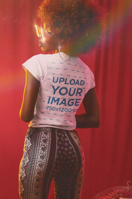 Back-View T-Shirt Mockup of a Woman in a 70s-Inspired Outfit
