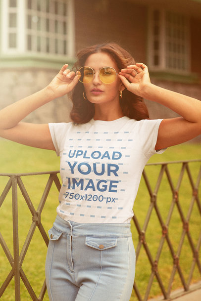Round-Neck Tee Mockup of a Woman with Retro Sunglasses 