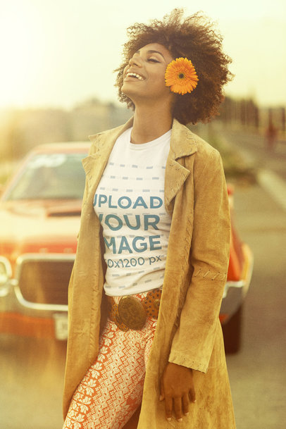 70s Styled T-Shirt Mockup Featuring a Joyful Woman Wearing a Flower Behind Her Ear m10513