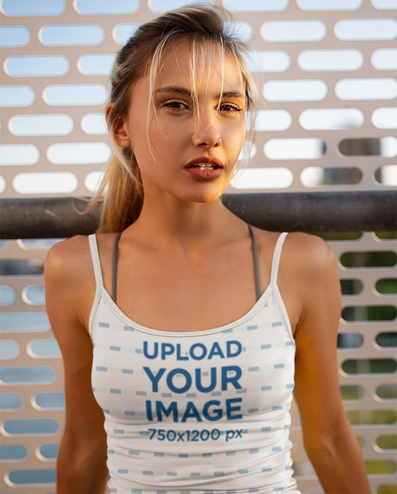 Mockup of a Young Woman Wearing a Sublimated Camisole Tank Top