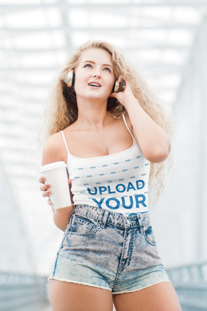Spaghetti Strap Tank Top Mockup Featuring a Young Woman Listening to Music