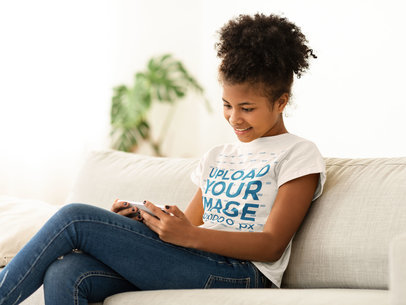 T-Shirt Mockup of a Girl Watching Something on Her Phone 45724-r-el2