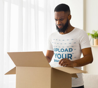 T-Shirt Mockup of an Angry Man Opening a Package 46247-r-el2