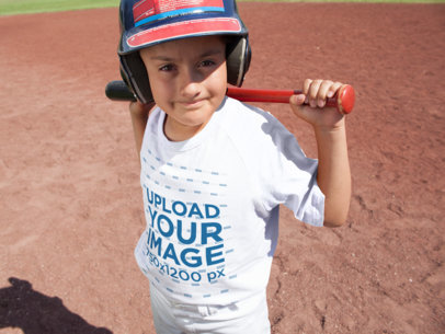 Baseball Uniform Designer - Kid with Helmet and Bat Wearing a Raglan T-Shirt
