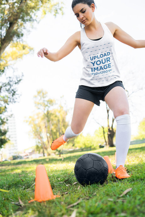 Tank Top Mockup of a Soccer Player Focused on Her Training