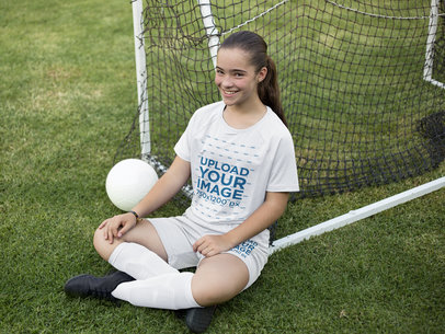 Custom Soccer Jerseys - Smiling Girl Sitting Down Near the Bow