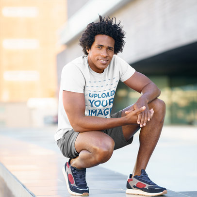 Round-Neck Tee Mockup Featuring a Man Wearing Sportswear
