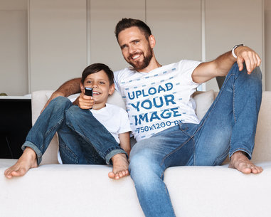 T-Shirt Mockup of a Man Watching TV With His Son