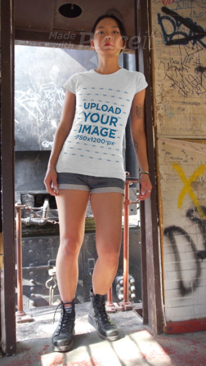 T-Shirt Video of a Woman Posing at an Abandoned Wagon