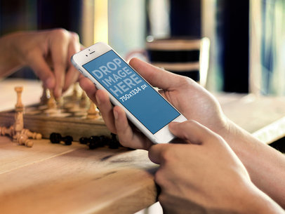 Screenshot Mockup of an iPhone 6 Featuring Chess Players