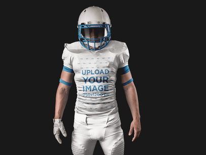 Custom Football Uniform Designer - Man Standing with Helmet On