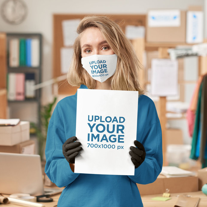 Face Mask Mockup of a Woman Holding a Customizable Flyer at a Store