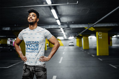 Mockup of a Man with a Heather T-Shirt at an Underground Parking Lot