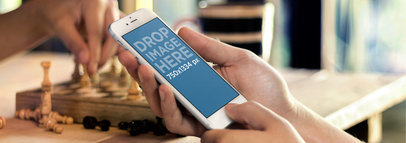 Wide Screenshot Mockup of an iPhone 6 Featuring Chess Players