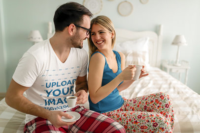 V-Neck T-Shirt Mockup of a Man and His Wife Having Coffee in Bed 