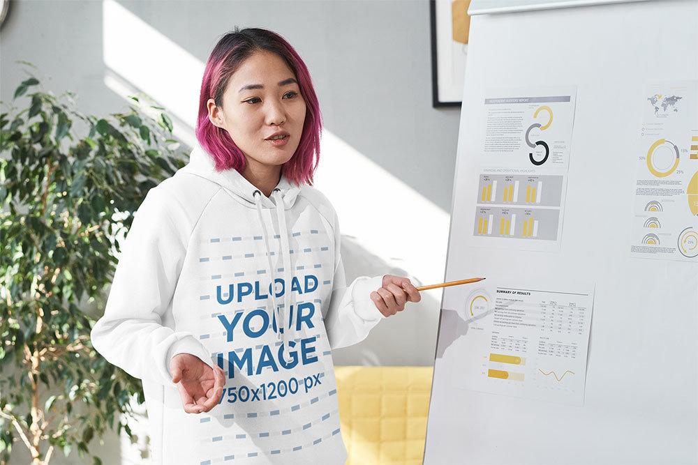 Hoodie Mockup of a Young Woman Giving a Presentation