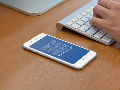 Mockup of a White iPhone 6 in an Office