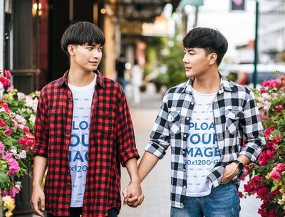 Round-Neck T-Shirt Mockup Featuring an LGBT Couple Holding Hands in the Street