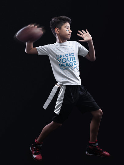 Custom Football Jerseys - Kid Throwing the Ball in Black Room