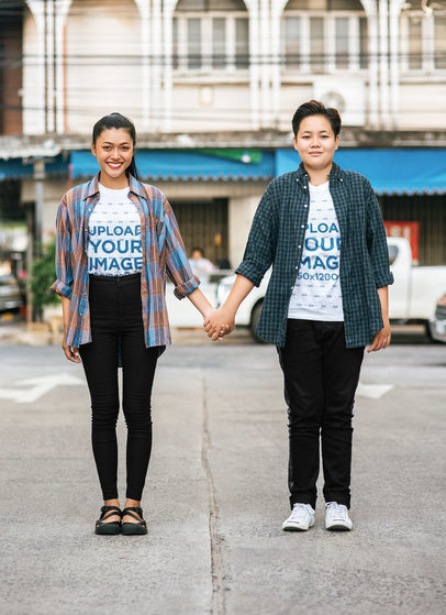LGBT Pride-Themed Tee Mockup of Two Women Holding Hands on a Street m4671 r-el2
