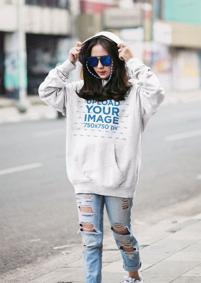 Mockup of a Young Trendy Woman Wearing an Oversized Hoodie